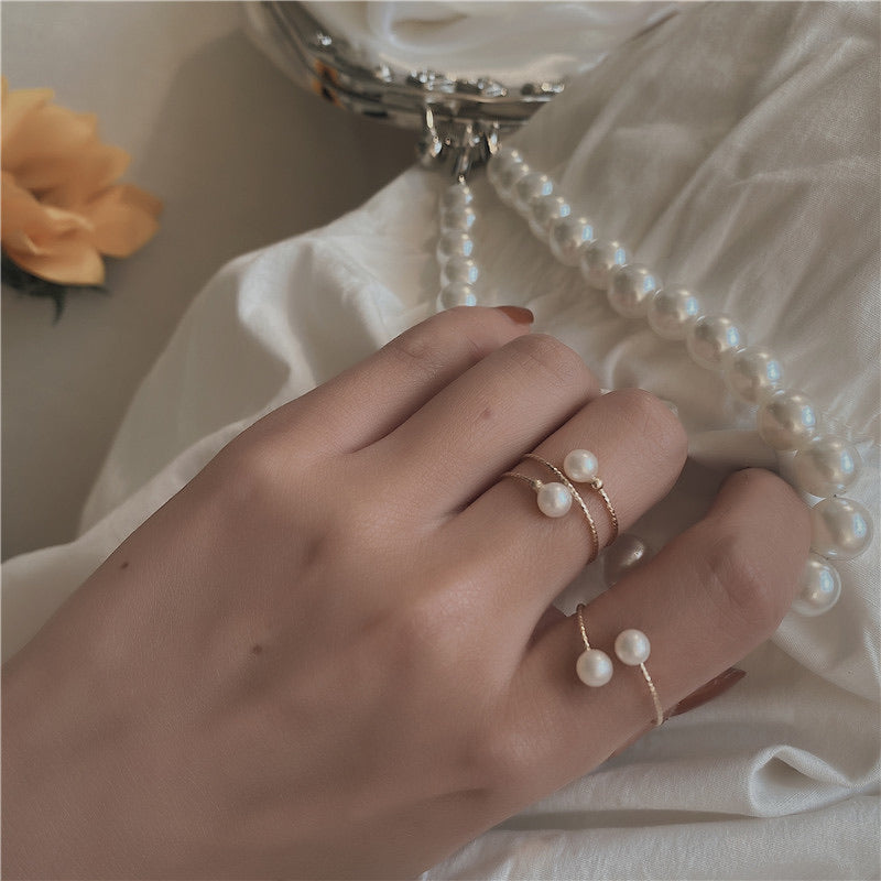 Pearl Swan Rings