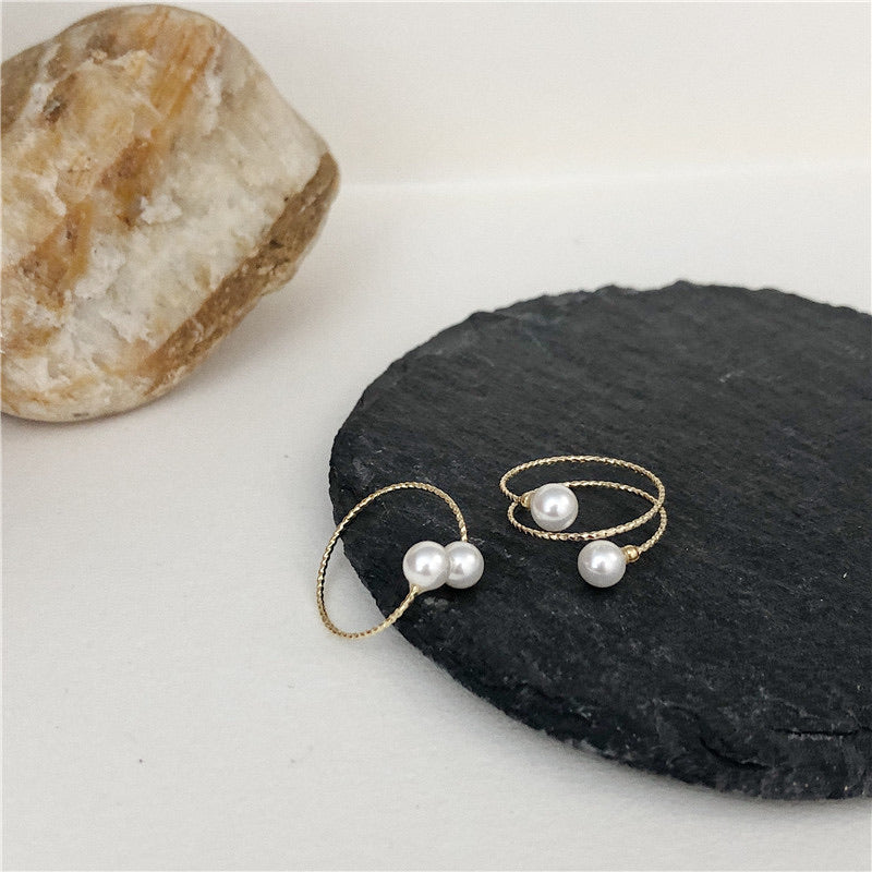 Pearl Swan Rings